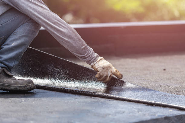 Professional Basement Waterproofing technician working in Rudolph, OH